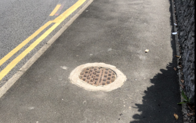 Settlement for injury caused by defective manhole cover